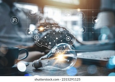 lightbulb, idea, strategy, creativity, information, network, knowledge, solution, imagination, creative. light bulb put on table side of cup. a round that has idea strategy creativity information.