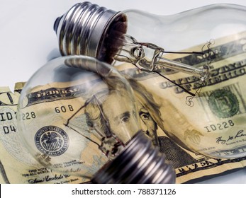 A Lightbulb On Dollar Bill, Energy Saving Concept