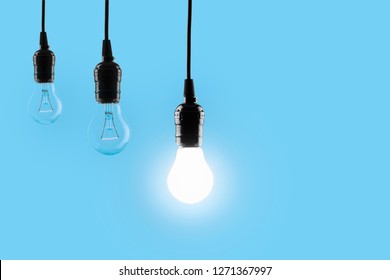 Lightbulbs hang in the air - Powered by Shutterstock