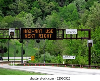 Lighted Overhead Highway Sign Hazmat Use Next Righ