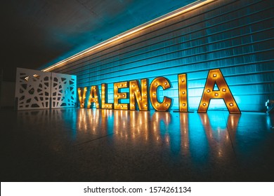 Lighted Valencia sign. City lights of Valencia, Spain.