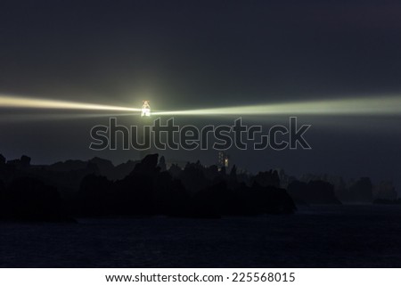 Lighted very powerful lighthouse in full night