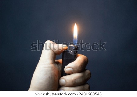 lighter object with burning fire