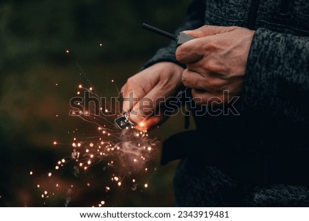 Lighter steel in action with sparks