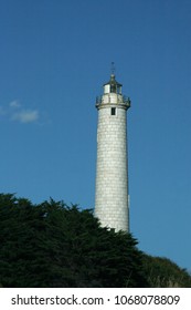 Lighthouse against the blue sky