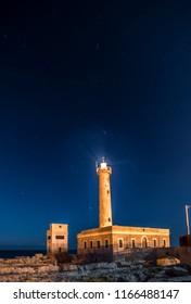 Lighthouse Of Augusta At Night With The Stars In Sicily