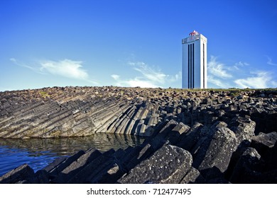 Lighthouse by the beach.