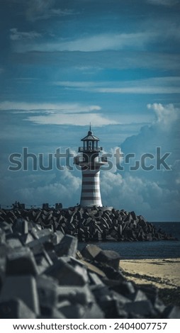 Similar – Image, Stock Photo Lighthouse in autumnal thunderstorm atmosphere