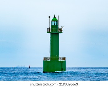 Lighthouse In The Calm Sea