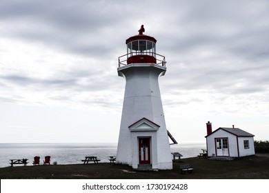Lighthouse In Cap Gaspe Or Land's End In Gaspé Peninsula During A Cloudy Day, Quebec 