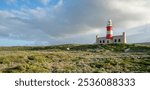 Lighthouse of Cape Agulhas, the geographic southern tip of Africa and the beginning of the traditional dividing line between the Atlantic and Indian Oceans