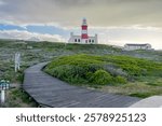 Lighthouse of Cape Agulhas, the geographic southern tip of Africa and the beginning of the traditional dividing line between the Atlantic and Indian Oceans