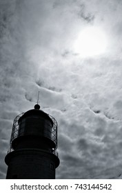 Lighthouse and cloudy sky