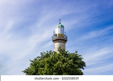 lighthouse covered by a tree