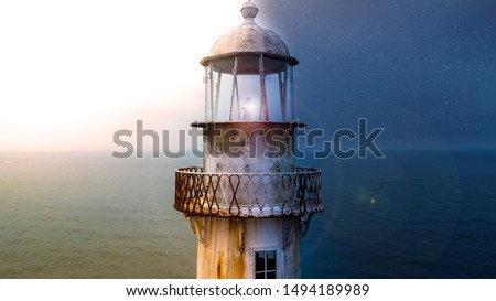 Similar – Image, Stock Photo Lighthouse in autumnal thunderstorm atmosphere