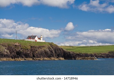 The Lighthouse In Dingle, Ireland.