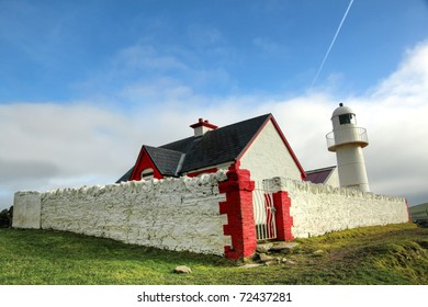 The Lighthouse In Dingle, Ireland.