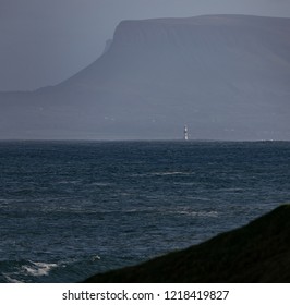 Lighthouse Dwarfed By Knocknarea