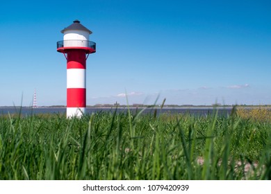 Lighthouse at the Elbe river in Germany.