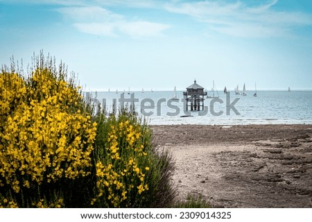Lighthouse at the End of the World or Le Phare du Bout du Monde in La Rochelle France. landscape format. copy space for text Stock fotó © 