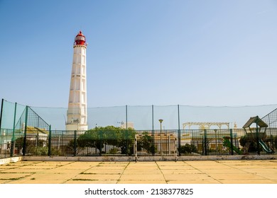 Lighthouse at Farol Island, Faro District, Algarve, Portugal