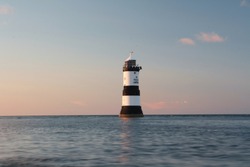 Lighthouse At Full Tide