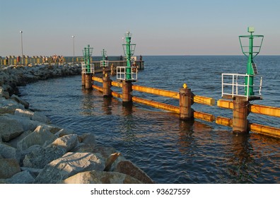 Lighthouse at harbor gateway