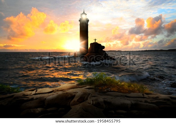 Lighthouse keeper on lighthouse with beacon at\
sunset evening.
