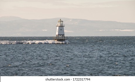 Lighthouse At Lake Champlain, Vermont. During Winter