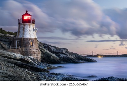 Lighthouse light on the seashore. Lighthouse light. Sea shore lighthouse. Lighthouse
