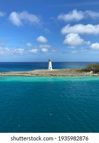 A lighthouse in the middle of the ocean 