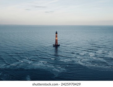 Lighthouse in the middle of the ocean