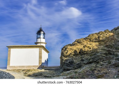 Lighthouse in mountains.