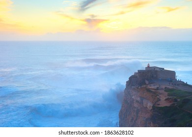 Lighthouse At Nazare. The Place With Biggest Waves To Surf On The Planet. Portugal