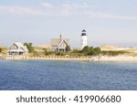 Lighthouse on Cape Cod With Beach And Water