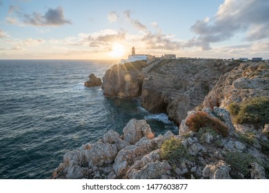 The lighthouse on Cliff at Cabo de São Vicente near Lagos in the South Portugal during the Sunset