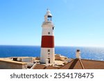 Lighthouse on the coast of Gibraltar, Great Britain- The Europe Point Lighthouse, which stands at the very end of the headland, was built in 1841    