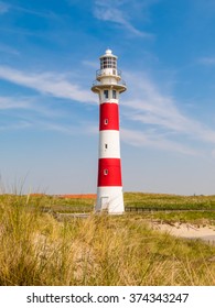 Lighthouse on the coast of the North Sea by sunny day, Belgium