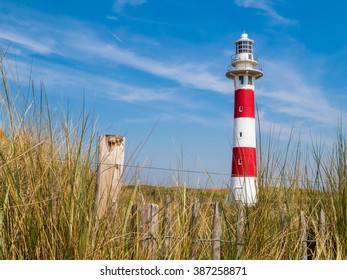 Lighthouse on the coast of the North Sea in a sunny day, Belgium