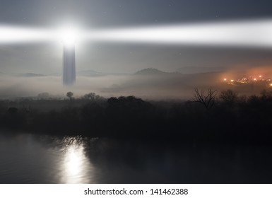 Lighthouse On The Fog