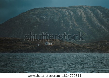 The lighthouse on Barøya Island in Narvik municipality in Nordland on Ofotfjorden near the entrance to Efjorden in Norway