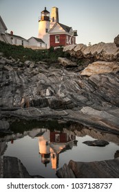 Lighthouse reflection in water