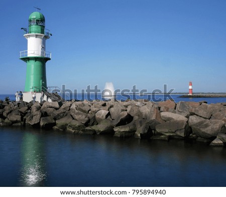 lighthouse and sailingship