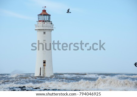 Lighthouse and sea