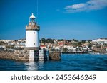 Lighthouse in St. Peter Port Harbour, Guernsey, Channel Islands, United Kingdom, Europe