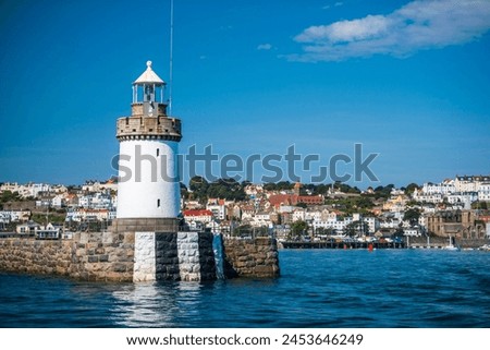 Lighthouse in St. Peter Port Harbour, Guernsey, Channel Islands, United Kingdom, Europe