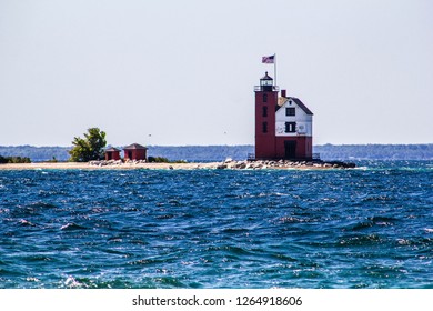 A Lighthouse In The Straits Of Mackinac