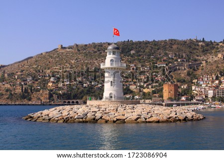 Lighthouse with the Turkish flag, in Alanya port, Turkey