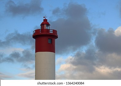 LIGHTHOUSE AT UMHLANGA ROCKS AGAINST THE SKY AND CLOUDS - Shutterstock ID 1364240084