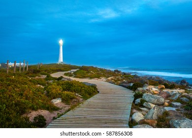 A lighthouse under a cloudy sky